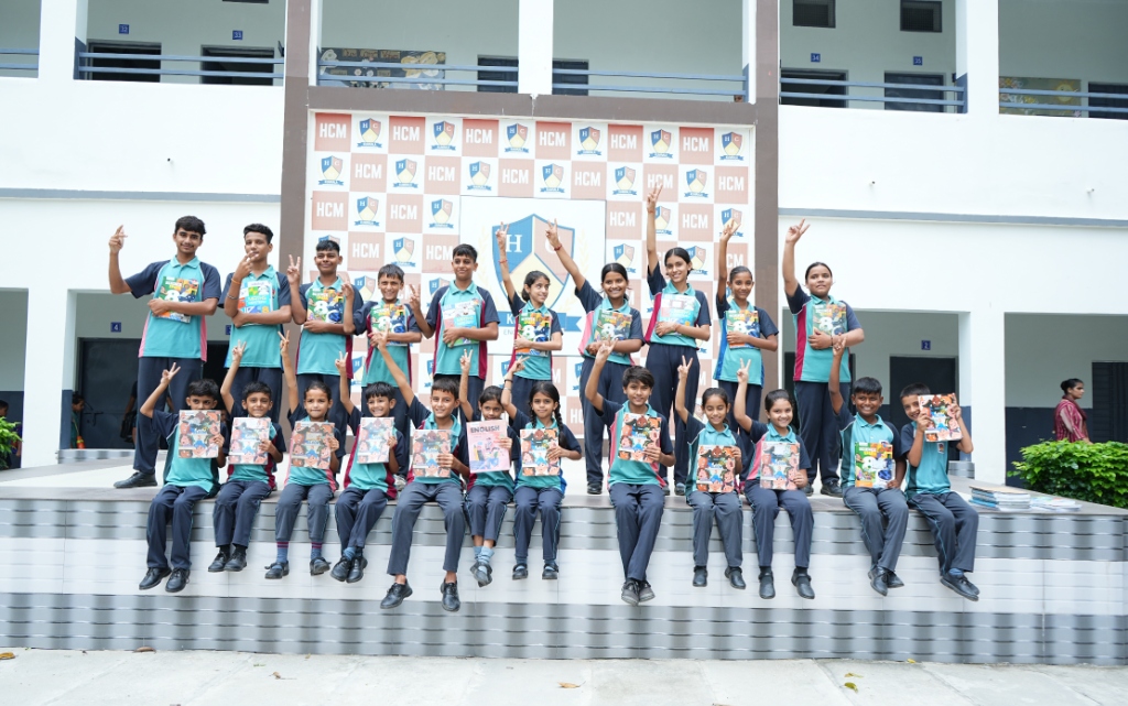School students holding Edubull smart hybrid books